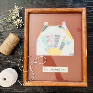 15”x12” Mat board framed Antique quilt.